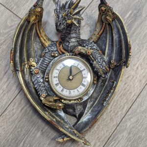 Steampunk dragon clock in platinum and gold colours